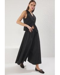 Trendyol - Schwarzer Rock-Look, Matt Strukturierte Palazzo-Hose Mit Extra Weitem Bein Und Elastischer Taille Für Damen - Lyst
