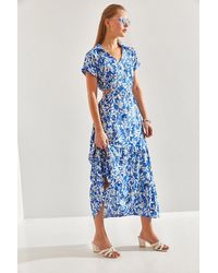Bianco Lucci - Tief Ausgeschnittenes Kleid Mit V-Ausschnitt Und Schleife Für Damen - Lyst