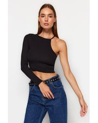 Trendyol - Schwarze, Gerippte, Taillierte, Dehnbare Strickbluse Mit Einem Ärmel Und Rundhalsausschnitt Für Damen - Lyst