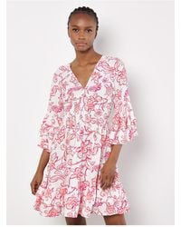 Apricot - Gesmoktes Rüschen-Minikleid Mit Blumenmuster Für Damen - Lyst