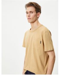 Koton - T-shirt mit rundhalsausschnitt, tasche, detail, kurzärmelig, baumwolle - Lyst