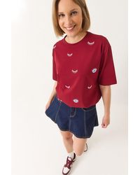 Bianco Lucci - T-Shirt Aus Baumwolle Mit Kurzen Ärmeln Und Augenmuster - Lyst