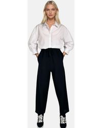 Trend Alaçatı Stili - Schwarze Palazzo-Hose Aus Leinen Mit Doppelter Tasche Vorne Und Hoher Taille Für Damen - Lyst