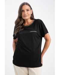 Defacto - Kurzarm-t-shirt mit normaler passform und glitzernden details k7701az23sp - Lyst