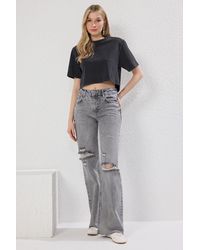 Trendyol - Graue, Zerrissene, Detaillierte Jeans Mit Normaler Taille Und Weitem Bein Für Damen - Lyst