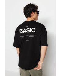 Trendyol - Es, übergroßes/weit geschnittenes, kurzärmliges t-shirt aus 100 % baumwolle mit textdruck - l - Lyst