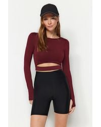 Trendyol - Burgunderrote Crop-Hose Mit Fenster/Ausschnitt. Detailliertes Detail Des Daumenlochs. Gestricktes Sport-Top/Bluse Für Damen - Lyst