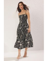 Trendyol - Schwarzer Tropischer Rock, Gewebtes Midi-Kleid Mit Gips An Der Taille Für Damen - Lyst