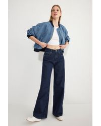 Trendyol - Dunkelblaue Jeans Mit Normaler Taille Und Weitem Bein Für Damen - Lyst