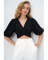 Trend Alaçatı Stili - Schwarze Bluse Mit V-Ausschnitt Und Knoten, Verdecktem Reißverschluss Und Ballonärmeln, Gewebt, Für Damen - Lyst