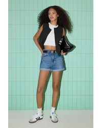 Trendyol - Dunkelblaue Mini-Jeansshorts Mit Hoher Taille Und Beinfalten Für Damen - Lyst