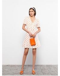 LC Waikiki - Lcw Lässiges Kleid Aus Viskose Mit V-Ausschnitt Und Gepunkteten Kurzen Ärmeln Für Damen - Lyst