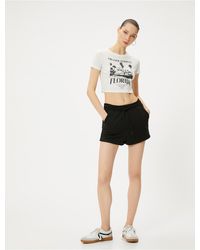 Koton - Kurze shorts mit bindegürtel und taschen bequeme passform - Lyst