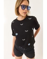 Bianco Lucci - T-Shirt Aus Baumwolle Mit Kurzen Ärmeln Und Augenmuster - Lyst