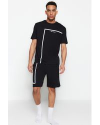Trendyol - Es pyjama-set mit rundhalsausschnitt und bedruckten shorts in normaler passform - Lyst