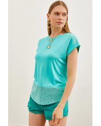 Olalook - Mintgrünes guipure-t-shirt mit details - Lyst