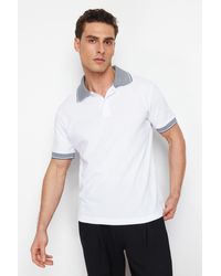 Trendyol - Es, strukturiertes t-shirt mit polokragen aus 100 % baumwolle mit normaler/normaler schnittform - Lyst