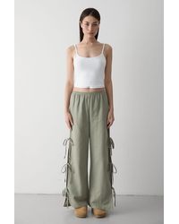 Laluvia - Khakifarbene Hose Aus 100 Baumwolle Mit Seitenschlitz Und Bindedetail – 3528 Für Damen - Lyst