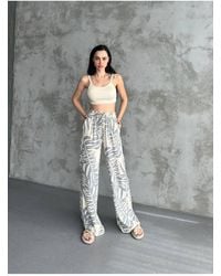 ZF BUTİK - Lockere Leinenhose Mit Weitem Bein – Taschen Und Elastischer Bund Für Damen - Lyst