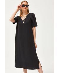 Olalook - Schwarzes Kleid Mit V-Ausschnitt Und Seitlichem Schlitz Und Weicher Struktur Für Damen - Lyst