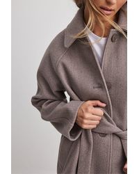 NA-KD - Normaler mantel mit raglanärmeln und gürtel - Lyst