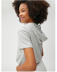 Koton - College-bedrucktes t-shirt mit kurzen ärmeln und kapuze - Lyst