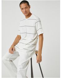 Koton - Basic-t-shirt mit rundhalsausschnitt, gestreift - Lyst