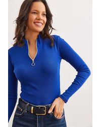 Olalook - Blaue Saks-Lycra-Bluse Mit Rollkragenpullover Und Reißverschluss Blz- 19001155 Für Damen - Lyst
