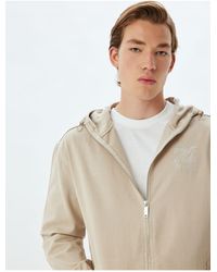 Koton - Bestickte Jeansjacke Mit Kapuze Und Reißverschlusstasche Aus Baumwolle Für Herren - Lyst