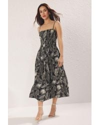 Trendyol - Schwarzer Tropischer Rock, Gewebtes Midi-Kleid Mit Gips An Der Taille Für Damen - Lyst