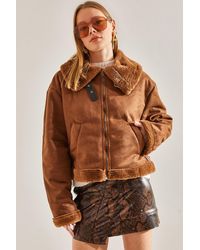 Bianco Lucci - Mantel Aus Laminiertem Leder Mit Seitlichem Gürtel 2248 Für Damen - Lyst