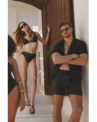 Trendyol - Es bikini-set mit hoher taille, hohem beinausschnitt und dreiecksketten-zubehör - Lyst