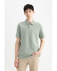 Defacto - Neues polo-t-shirt mit normaler passform und kurzen ärmeln b4939ax24sp - Lyst