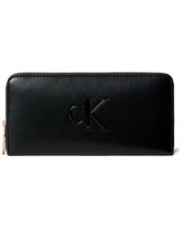 Calvin Klein - Lange Geldbörse Mit Reißverschluss Und Markantem Monogramm - Lyst