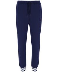 Pantalones de chándal Fila de hombre: hasta el 73 % de descuento | Lyst