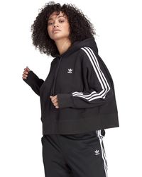 Adidas originals hoodie legergroen - Vindjeschoen.nl