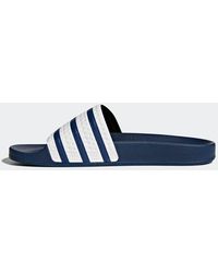 adidas Slippers for Men - Up to 67% off at Lyst.com