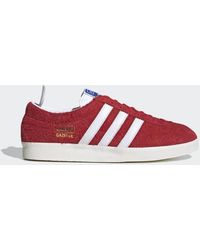mens red gazelle trainers