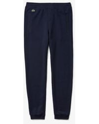 Lacoste Track pants and sweatpants for Women | Online Sale up to 44% off |  Lyst