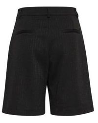 Ichi - Pantalones cortos negros con rayas brillo - Lyst