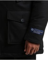 Woolrich Grand Parka Arctique Loro Piana en Laine Noire et Fourrure Amovible