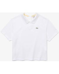 Camisetas y tops Lacoste de mujer: hasta el 40 % de descuento | Lyst