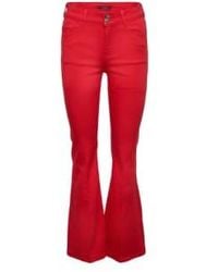 Esprit - Bootcut jeans con pliegues prensados rojo - Lyst
