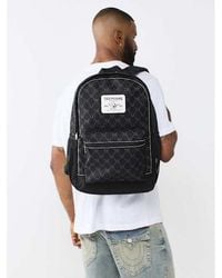TRUE RELIGION - Logo Patch Allover Print Backpack - Lyst