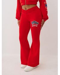 True Religion - Crystal V Waistband Flared Sweat Pant - Lyst