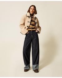 Twinset - Flared Jeans With Folded Hem - Lyst
