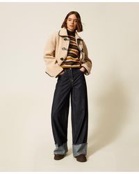 Twinset - Flared Jeans With Folded Hem - Lyst
