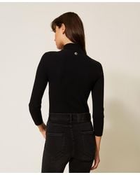Twinset - Turtle Neck Jumper With Brooch - Lyst