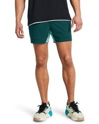 Under Armour - Project rock ultimate trainingsshorts für hydro teal / radial turquoise / schwarz l - Lyst