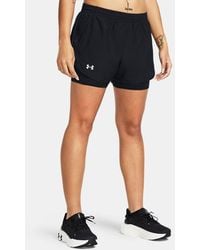 Under Armour - Fly-By 2-In-1 Damesshorts Zwart Zwart Reflecterend - Lyst